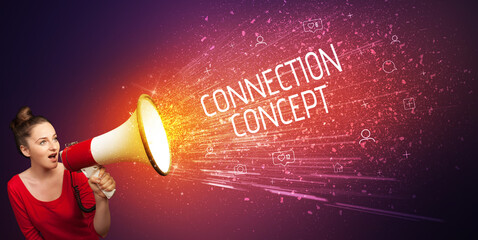 Young woman yelling to loudspeaker with CONNECTION CONCEPT inscription, social networking concept