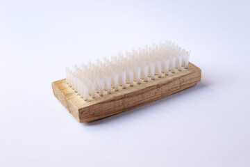 clothes brush made of wood with isolated background
