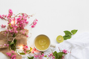 pink flower on sack with healthy drinks honey lemon for health care arrangement flat lay style on background white 