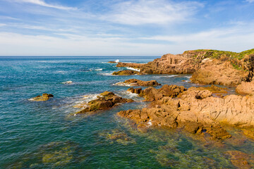 The brown Rocks and Tasman Sea at Birubi Point in regional Australia