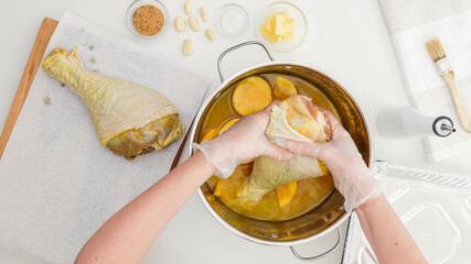 Turkey legs marinated with orange juice, orange slices, garlic, and spices. Roasted turkey legs...
