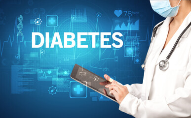young doctor writing down notes with DIABETES inscription, healthcare concept