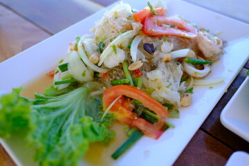 Spicy vermicelli salad with seafood, Asian food