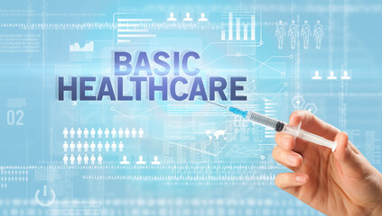 Close-up view of doctor's hand in a white glove holding syringe with BASIC HEALTHCARE inscription, healthcare and medical concept