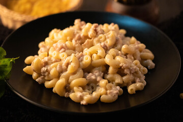 Macaroni Stir-fried with Carbonara Sauce in Black Plates