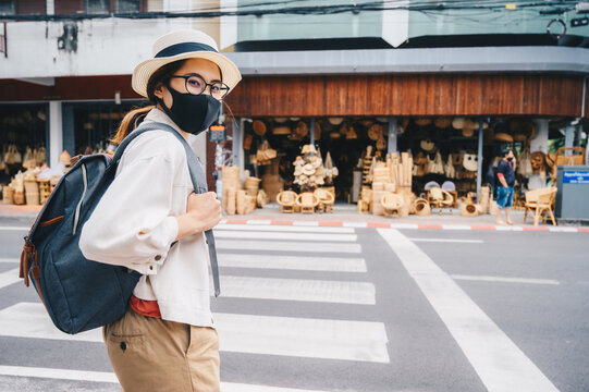 Tourist Woman Wearing Mask Before Visit Wicker Shop Located On Chang Moi Rd In The Downtown Of Chiang Mai Province.