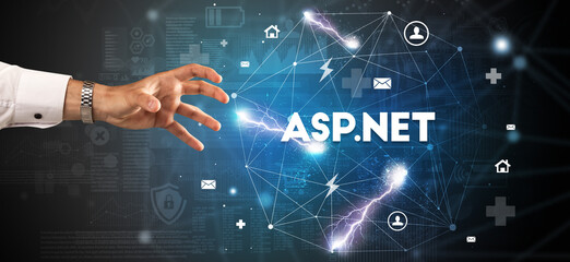Hand pointing at ASP.NET inscription, modern technology concept