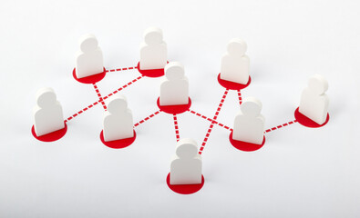 Business and social connection. Network of contacts with figurines of wooden people. Communication business concept.