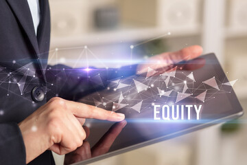 Close up hands using tablet with EQUITY inscription, modern business technology concept