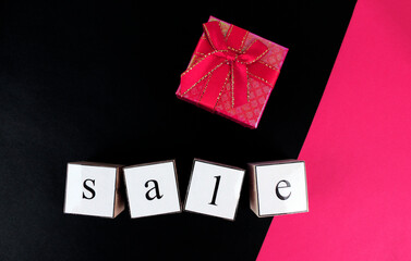 Lettering on a pink and black background 