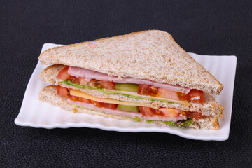 Club sandwich with ham and cheese