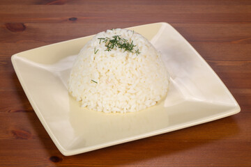 Fototapeta na wymiar Steamed rice in the plate