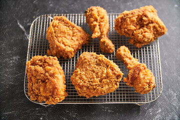 crispy southern style fried chicken in a black stone table
