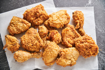 crispy southern style fried chicken in a black stone table