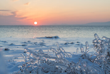 A sunset over the sea after the ice rain cyclone