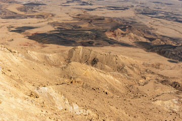 Fototapeta na wymiar Beautiful dramatic view of the desert. Wilderness. Nature landscape. Makhtesh crater Ramon Crater, Israel. High quality photo