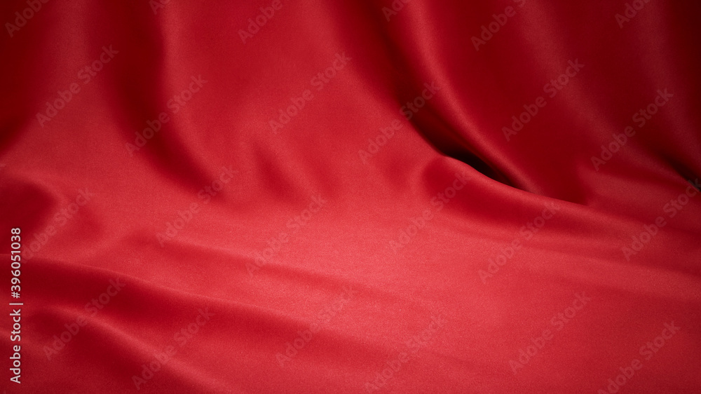 Wall mural red cloth waves texture background stage shot in table top for christmas background