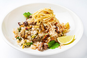 fried rice with eat and vegetables