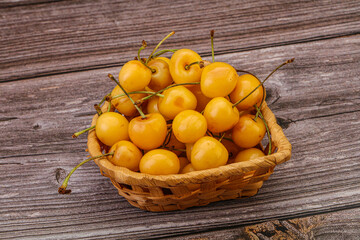 Sweet ripe yellow cherry heap