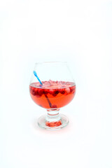 Homemade tincture of red cherry. Berry alcoholic drinks concept. Homemade red wine made from ripe cherries in a glass bottle