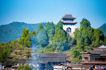  Street view local visitor and tourist in Furong Ancient Town (Furong Zhen, Hibiscus Town), China. Furong Ancient Town is famous tourism attraction place.