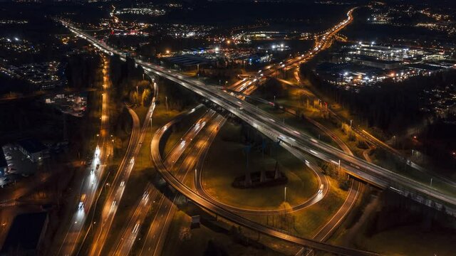 Aerial time-lapse of interchange traffic at night