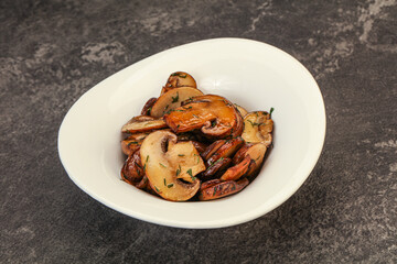 Roasted champignon with herbs and spices