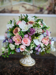 Bouquet of flowers in a vase on the table