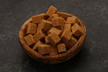 Cane sugar cubs in the bowl