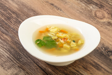 Tasty chicken soup with carrot