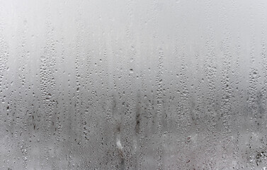 Dripping Condensation, Water Drops Background Rain drop Condensation Texture. Close up for misted glass with droplets of water draining down