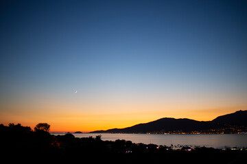 magnificent and sublime sunset in the Mediterranean sea of Corsica's island of beauty in summer with nobody without tourists in France