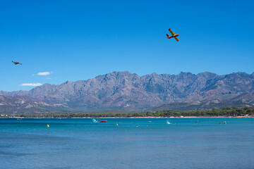 bomber plane on the beach of calvi for the fire in the mountains