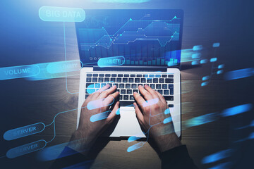 Man with laptop and big data interface