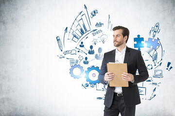 Man with clipboard and business sketch