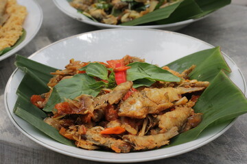 fried wader fish food and crispy and various chili sauce