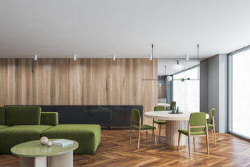 Gray and wooden living room corner with sofa and table