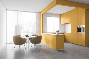 White and yellow kitchen corner with table