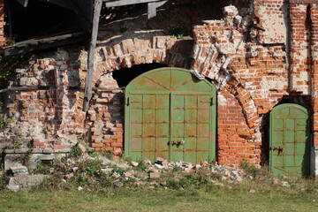 Fototapeta na wymiar Old iron gates in an abandoned Church