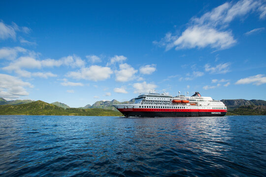 Hurtigruten's MS Finnmarken approaching the narrowest fjord in Norway, Trollfjord