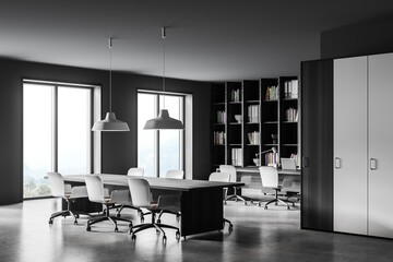 Modern gray meeting room corner with bookcase