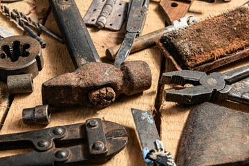 Old vintage household hand tools still life on a wooden background in a DIY and repair concept