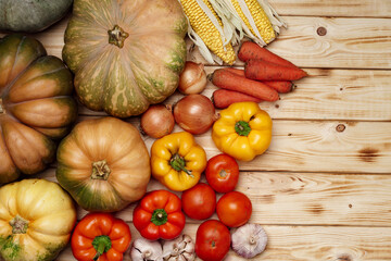 Autumn harvest of vegetables on wooden board