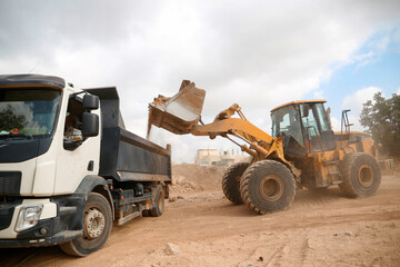 Bulldozer on the workplace, Excavators.
