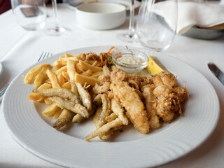Plate with aromatic pasta and seafood. Top view, close-up. Delicious and healthy food concept
