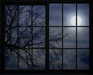 Full moon view through the window frame - 396079609
