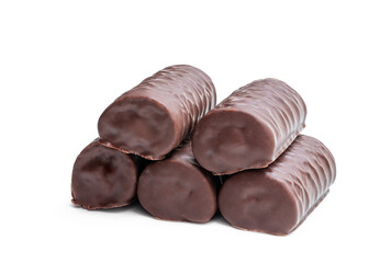 Chocolate sponge cake covered with milk chocolate isolated on white