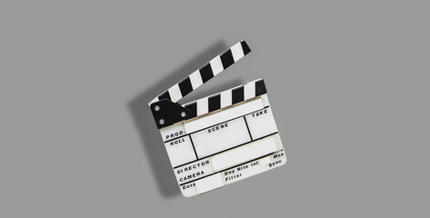director empty film making clapperboard or movie slate isolated on gray background.