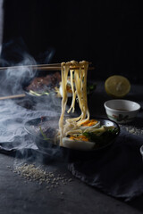 Japanese ramen soup on dark background