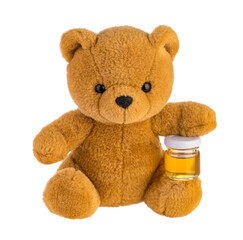 Teddy bear holding honey pot isolated without shadow